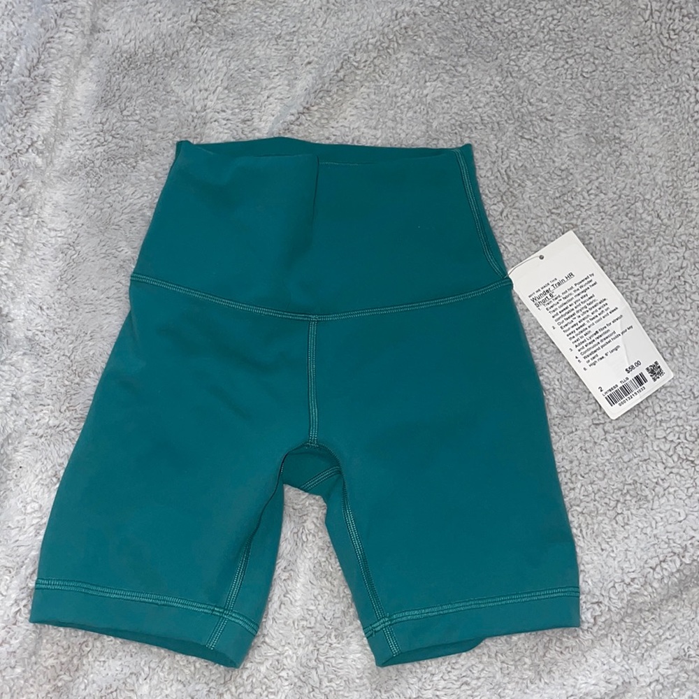 Wunder train HR short 6” turquoise. Never worn
